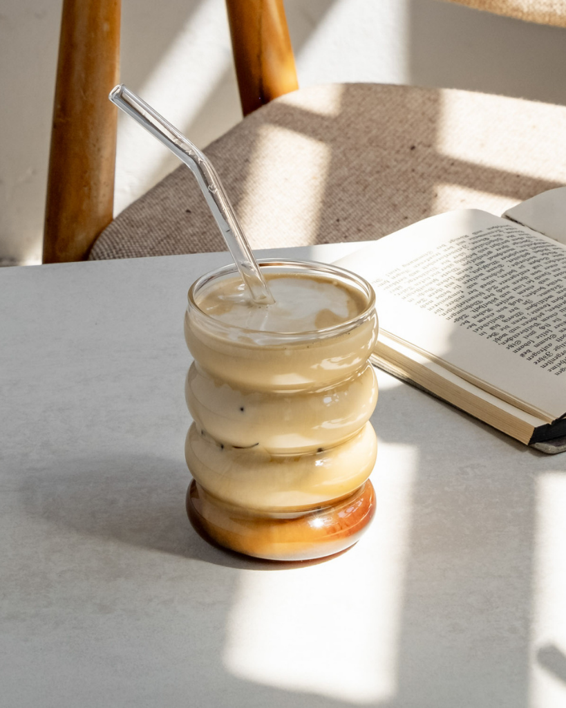 Modern Bubble Glass with unique 4-ring shape. 300ml capacity, dishwasher safe. Perfect for water, juice & entertaining. Comfortable ergonomic design.