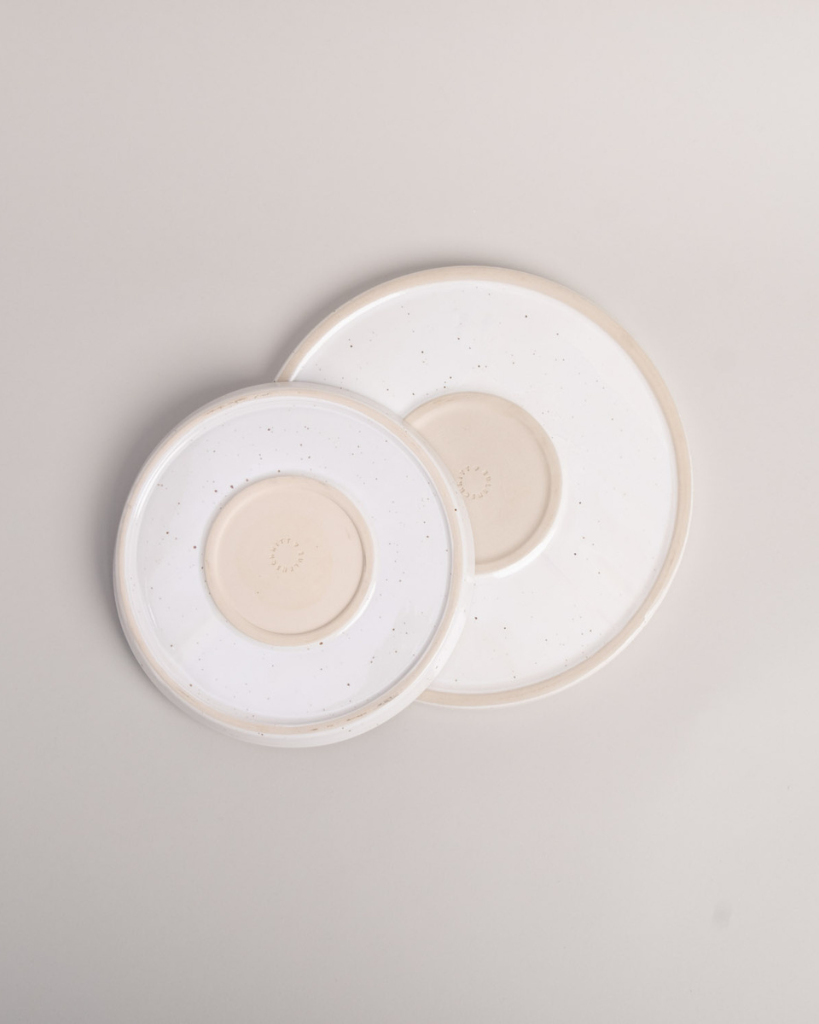 Elevate your dining experience with our handcrafted Calma dinner plate. Each 27cm plate features natural glaze variations and improved stackable design. Perfectly sized for main courses, this dishwasher-safe plate combines artisanal beauty with modern practicality.