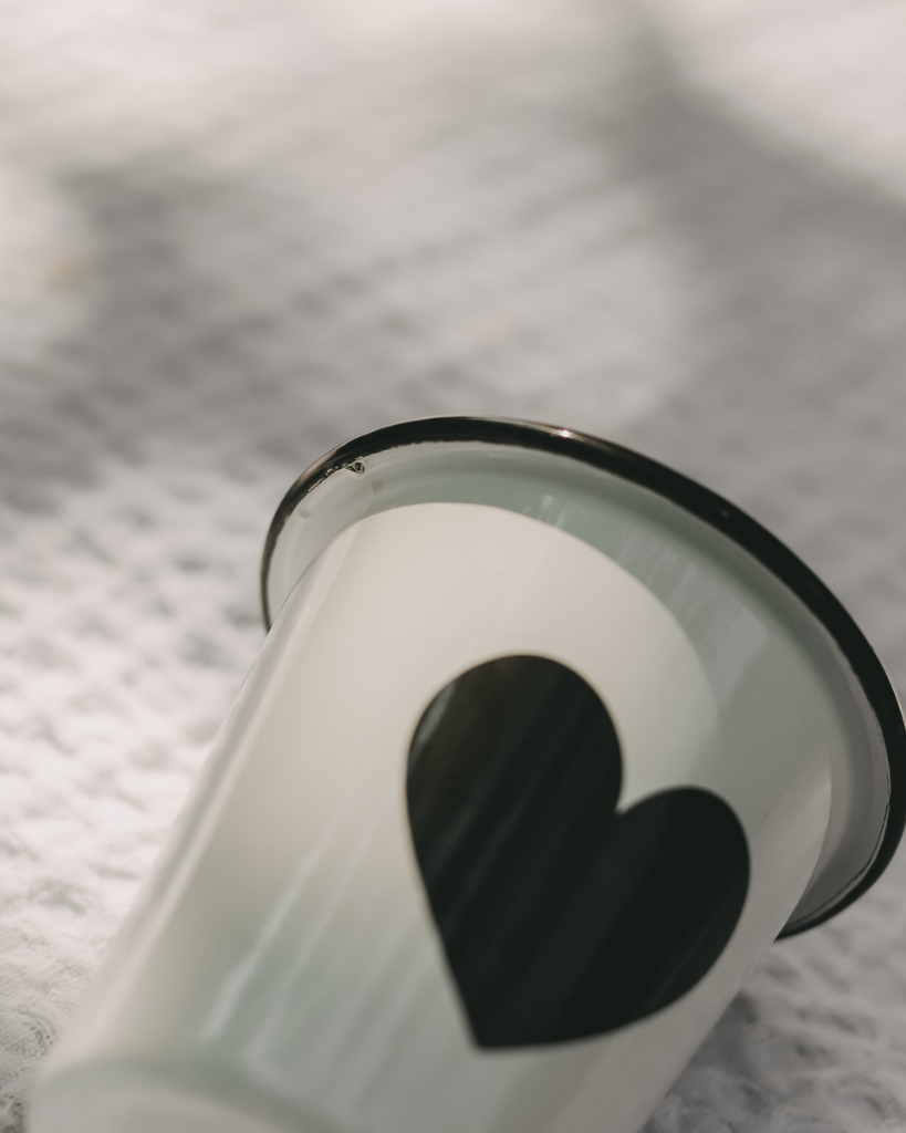Heart Pattern Enamel Camping Mug | 290ml | Outdoor & Camping Essential Add joy to your outdoor adventures with this charming enamel mug featuring delicate black hearts. Built tough for camping and picnics, this 290ml mug combines vintage style with modern durability. Dishwasher safe and easy to clean, it's perfect for hot drinks around the campfire or backyard gatherings. The sturdy enamel construction ensures long-lasting use while its compact size (9cm x 8.6cm) makes it ideal for camping kits and outdoor dining.