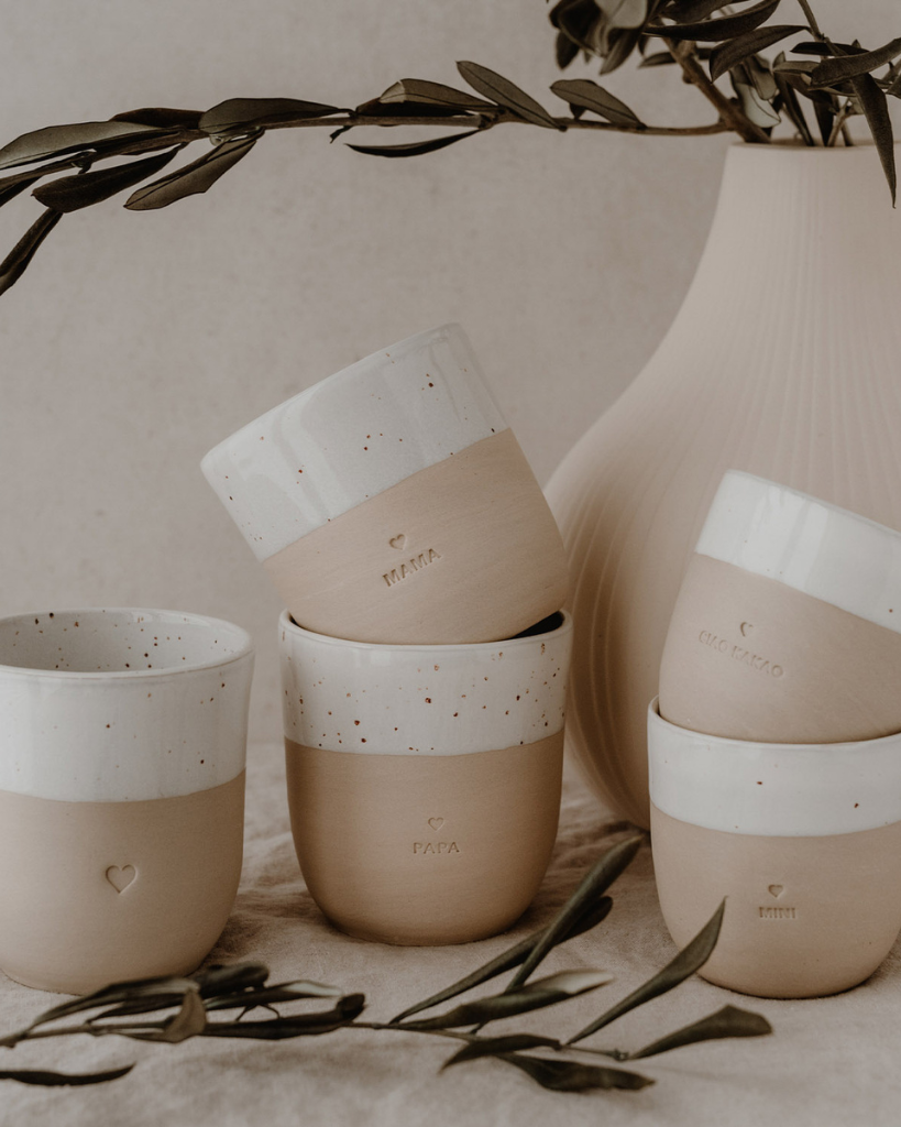 Discover the charm of handmade pottery with our exclusive stoneware heart mug. Each 320ml mug is carefully crafted in a small Portuguese pottery, featuring a beautiful embossed heart design. Every piece is unique, showcasing subtle variations in glaze and texture that make it truly special. Combining practicality with artisanal beauty, these dishwasher-safe mugs measure 8.5-9cm in height, perfect for your daily coffee or tea ritual.
