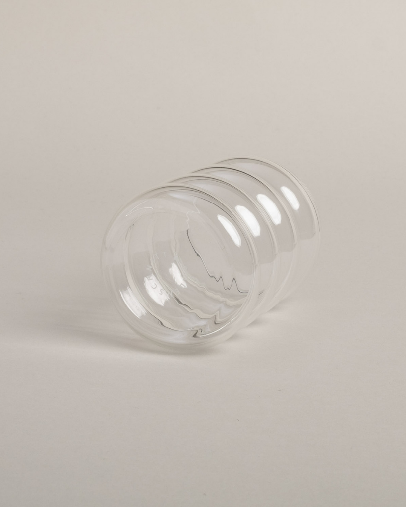 Modern Bubble Glass with unique 4-ring shape. 300ml capacity, dishwasher safe. Perfect for water, juice & entertaining. Comfortable ergonomic design.