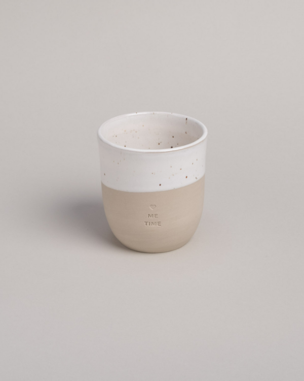 Me Time Stoneware Mug | 320ml | Handcrafted in Portugal Create perfect moments of calm with our handcrafted "Me Time" stoneware mug. Each 320ml mug is lovingly made in a small Portuguese pottery, featuring a mindful embossed message. Every piece is unique, with natural variations in glaze and texture that make it special. Dishwasher-safe and perfectly sized at 8.5-9cm height, it's your ideal companion for daily moments of peace.