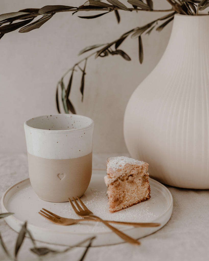 Discover the charm of handmade pottery with our exclusive stoneware heart mug. Each 320ml mug is carefully crafted in a small Portuguese pottery, featuring a beautiful embossed heart design. Every piece is unique, showcasing subtle variations in glaze and texture that make it truly special. Combining practicality with artisanal beauty, these dishwasher-safe mugs measure 8.5-9cm in height, perfect for your daily coffee or tea ritual.