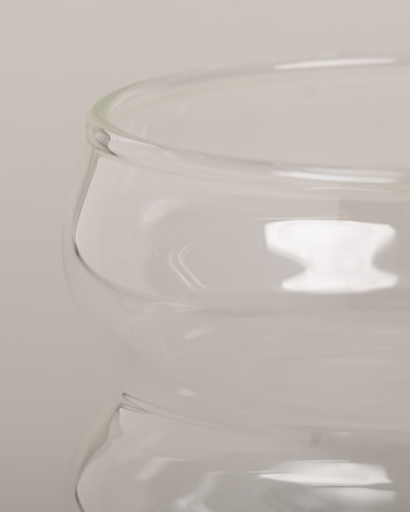 Modern Bubble Glass with unique 4-ring shape. 300ml capacity, dishwasher safe. Perfect for water, juice & entertaining. Comfortable ergonomic design.