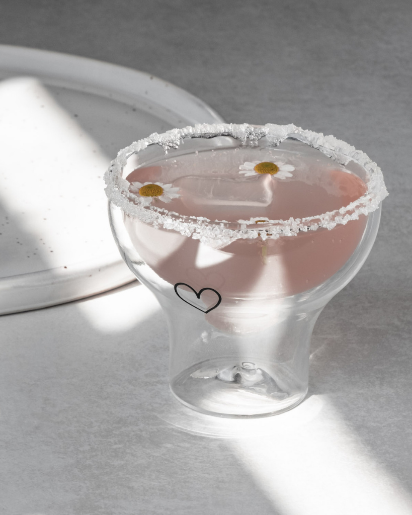 Serve in style with our double-walled heart glass. This elegant 100ml glass features temperature-maintaining design, perfect for cocktails and desserts. Dishwasher safe and heat-resistant for versatile entertaining.