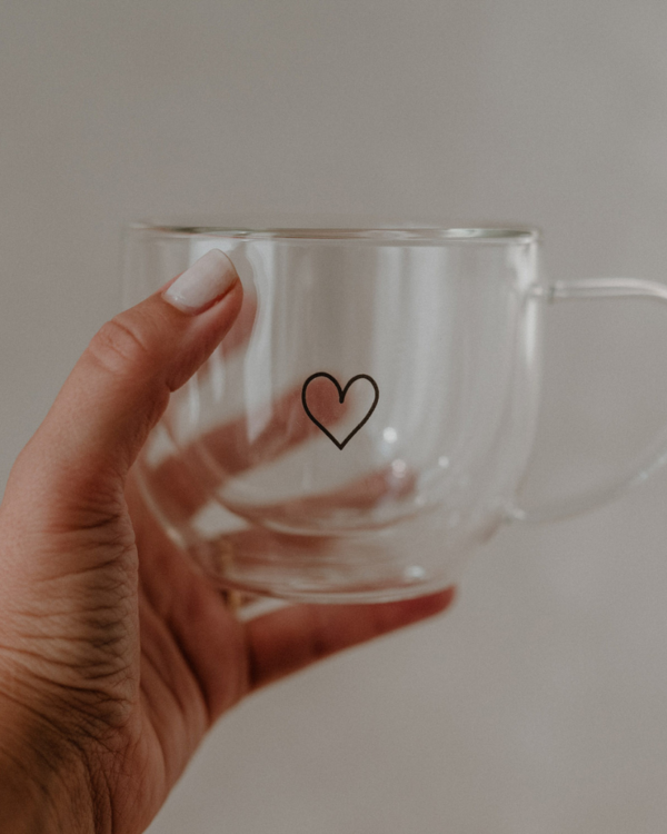 Elegant double-walled glass with heart design. 250ml capacity, keeps drinks hot while staying cool to touch. Heat-resistant & dishwasher safe.