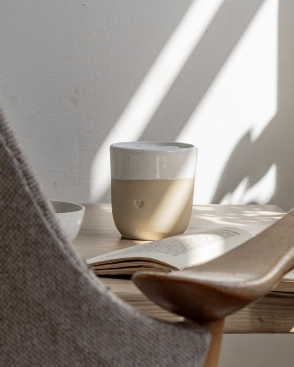 Discover the charm of handmade pottery with our exclusive stoneware heart mug. Each 320ml mug is carefully crafted in a small Portuguese pottery, featuring a beautiful embossed heart design. Every piece is unique, showcasing subtle variations in glaze and texture that make it truly special. Combining practicality with artisanal beauty, these dishwasher-safe mugs measure 8.5-9cm in height, perfect for your daily coffee or tea ritual.