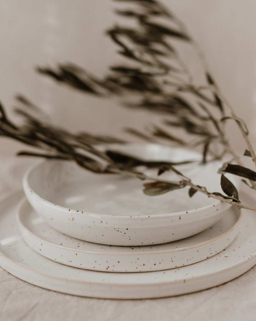 Elevate your dining experience with our handcrafted Calma dinner plate. Each 27cm plate features natural glaze variations and improved stackable design. Perfectly sized for main courses, this dishwasher-safe plate combines artisanal beauty with modern practicality.
