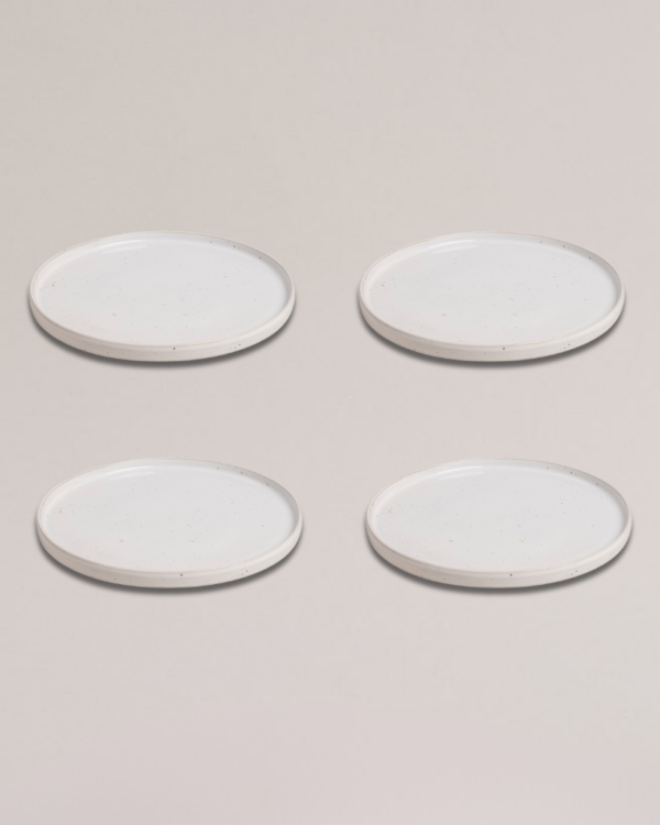 Elevate your dining experience with our handcrafted Calma dinner plate. Each 27cm plate features natural glaze variations and improved stackable design. Perfectly sized for main courses, this dishwasher-safe plate combines artisanal beauty with modern practicality.