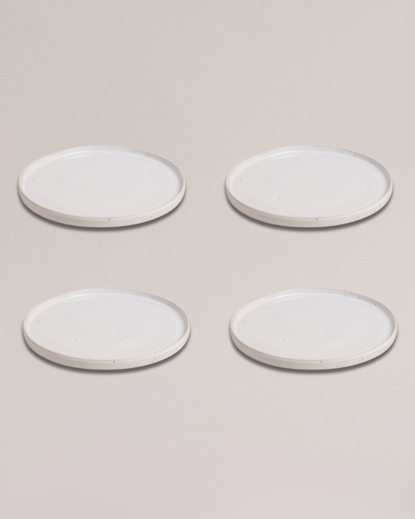 Elevate your dining experience with our handcrafted Calma dinner plate. Each 27cm plate features natural glaze variations and improved stackable design. Perfectly sized for main courses, this dishwasher-safe plate combines artisanal beauty with modern practicality.
