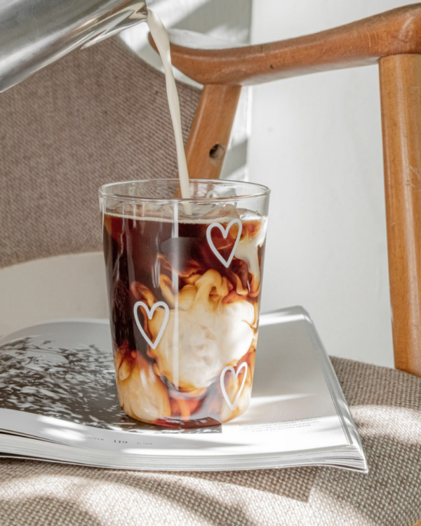 Fall in love with this charming glass tumbler featuring delicate white hearts! Perfect for everyday use, this 450ml drinking glass adds a touch of romance to your beverage experience.