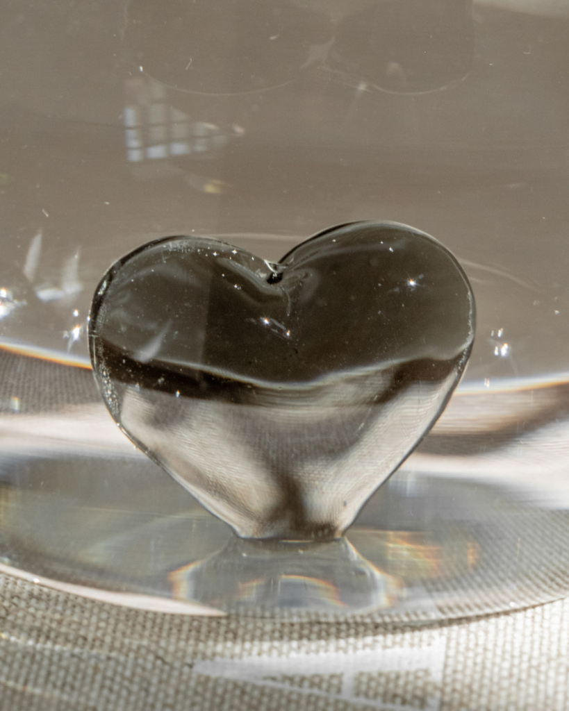 Elevate your drinkware with this unique black heart drinking glass. Featuring a striking 3D black heart design floating inside a high-quality glass, this piece adds a touch of elegance to any occasion. Perfect for everyday use or special gatherings, this glass is both beautiful and practical.