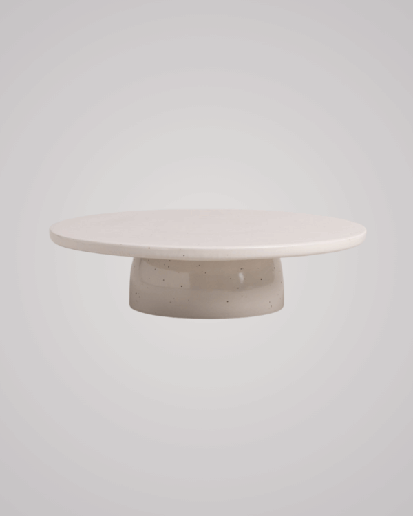 Showcase your cakes beautifully with our handmade Calma stoneware cake stand, now in 7cm and 10cm heights. Featuring a 28cm diameter, unique glaze, and easy-to-clean surface, it's perfect for celebrations and stylish decoration. Use both sizes together for a tiered display!