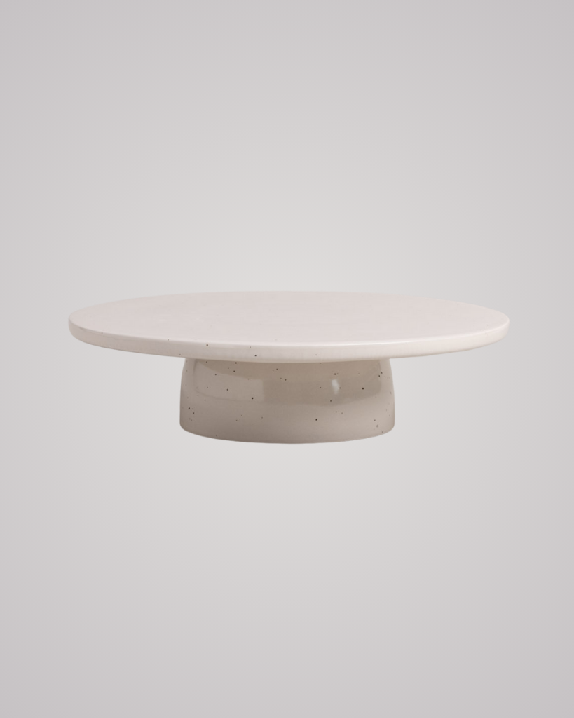 Showcase your cakes beautifully with our handmade Calma stoneware cake stand, now in 7cm and 10cm heights. Featuring a 28cm diameter, unique glaze, and easy-to-clean surface, it's perfect for celebrations and stylish decoration. Use both sizes together for a tiered display!