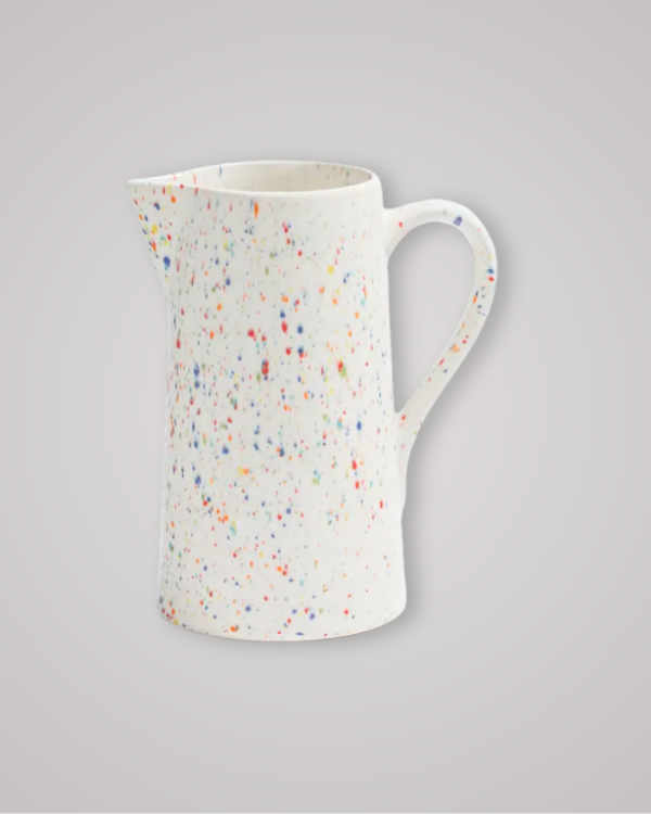 White stoneware pitcher with glossy reactive glaze. Handmade in Portugal, food safe, dishwasher and microwave safe. Capacity 1.5 L. Ideal for everyday use.